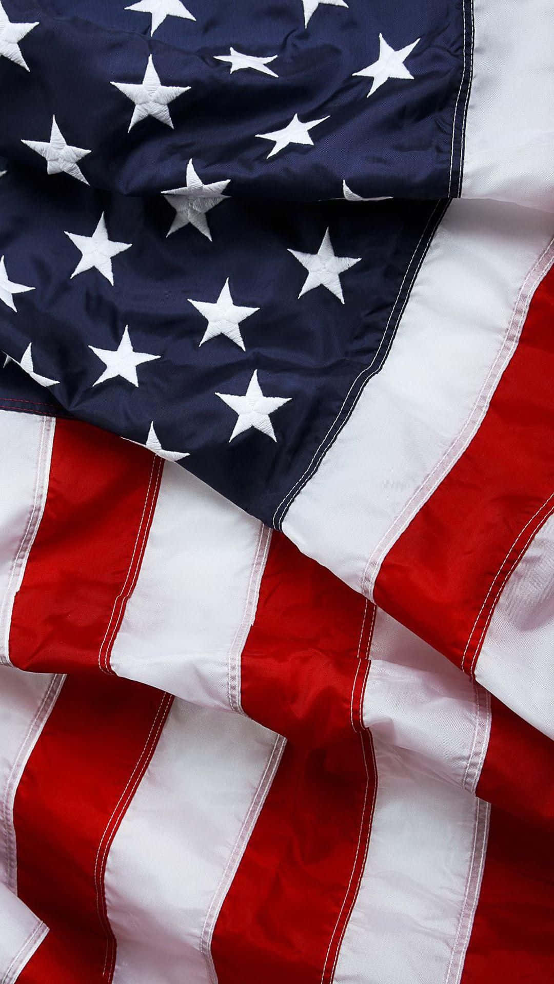 An American Flag Is Shown In Close Up Background