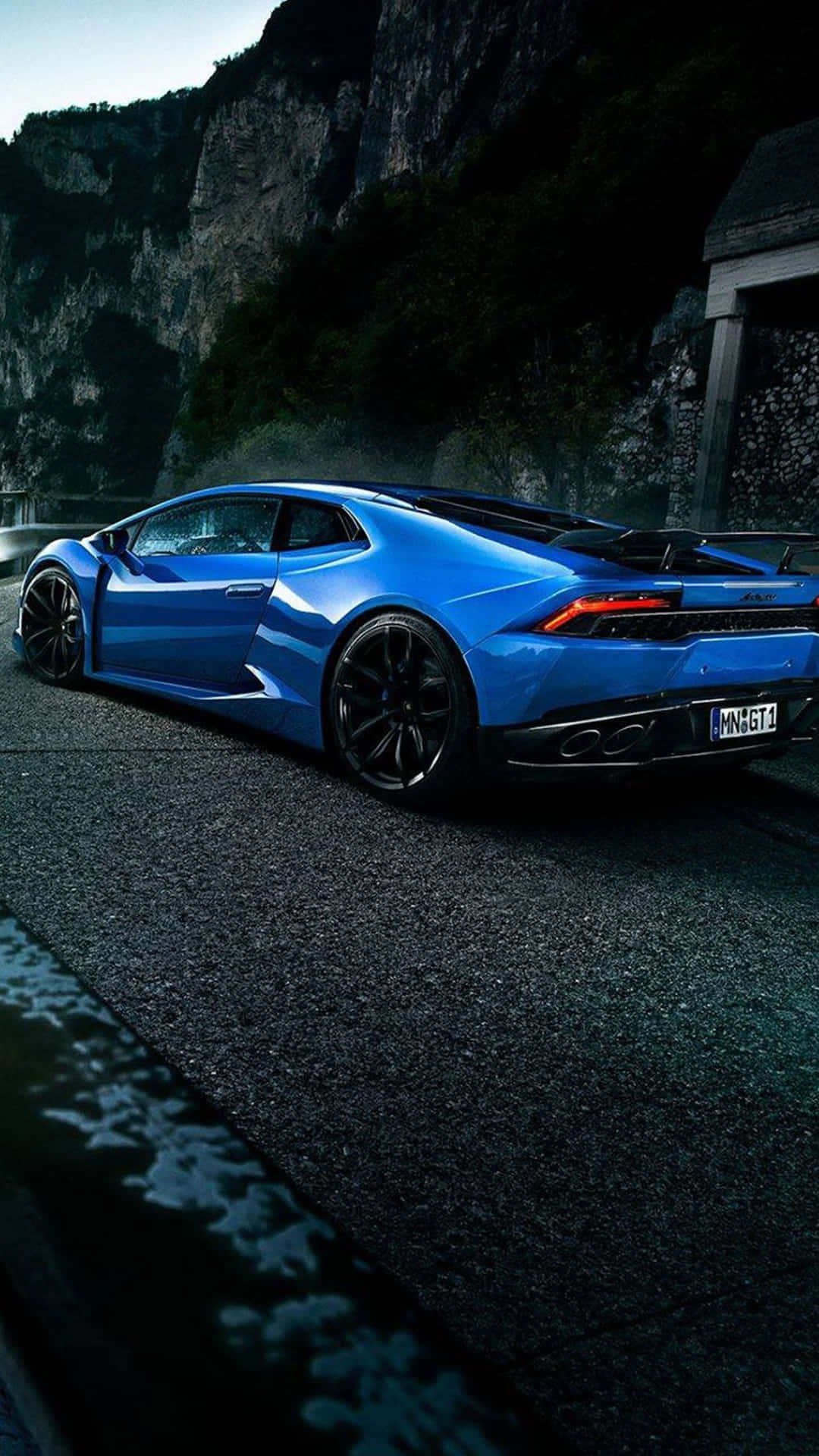 An Android-powered Car Treks Through A Beautiful Valley Background