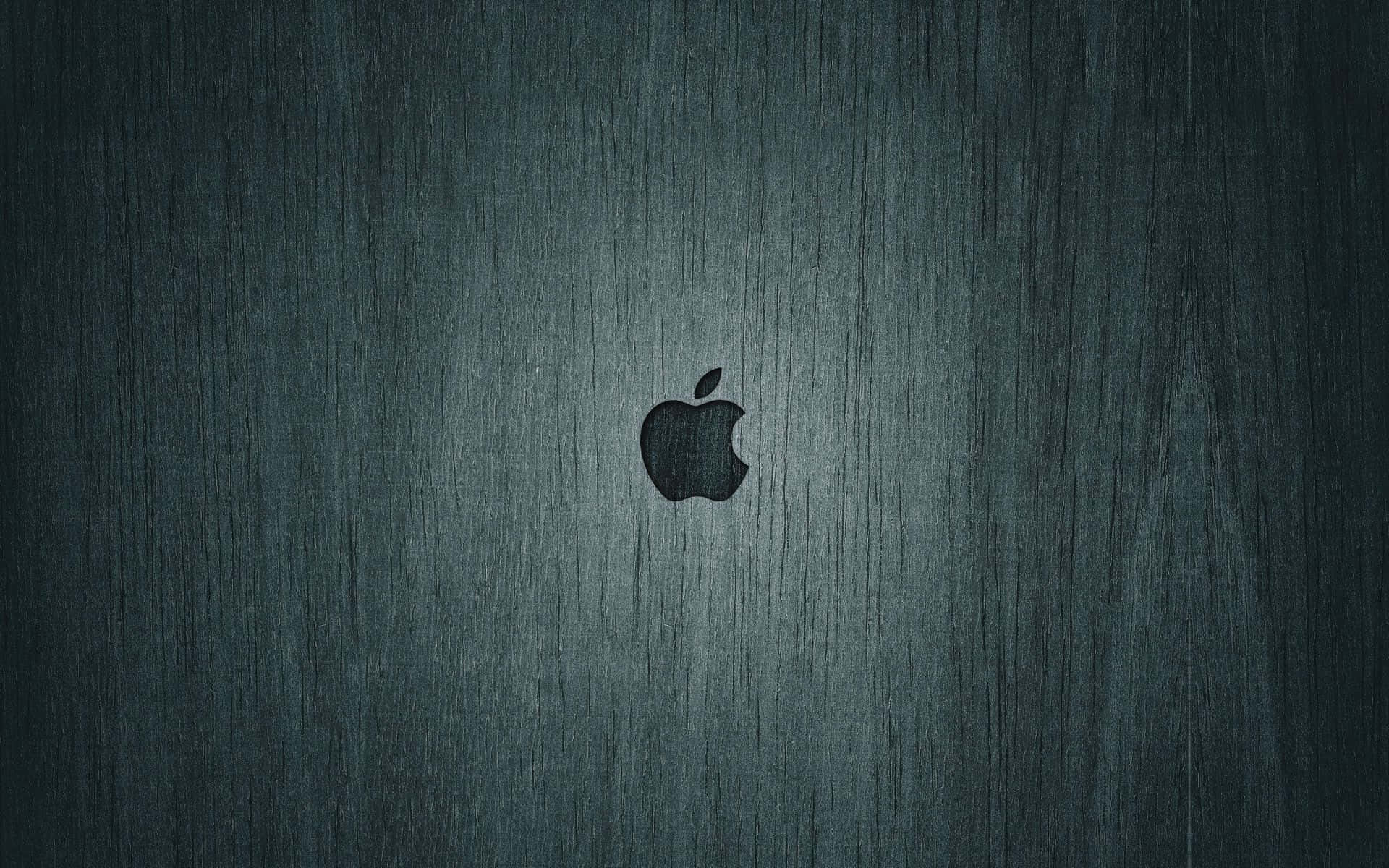 An Apple Mac Desktop In A Modern Abstract Design Background
