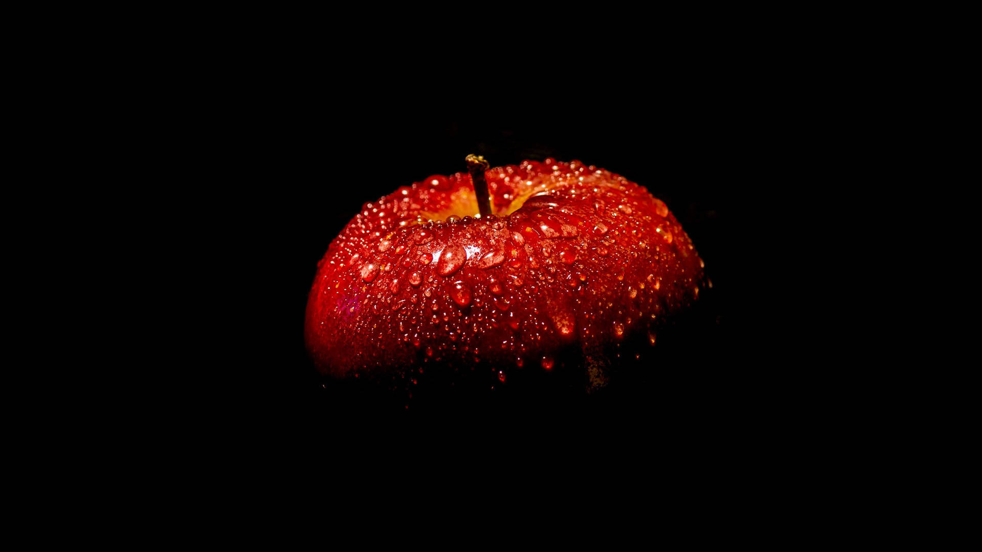 An Apple With Water Drops On It Background