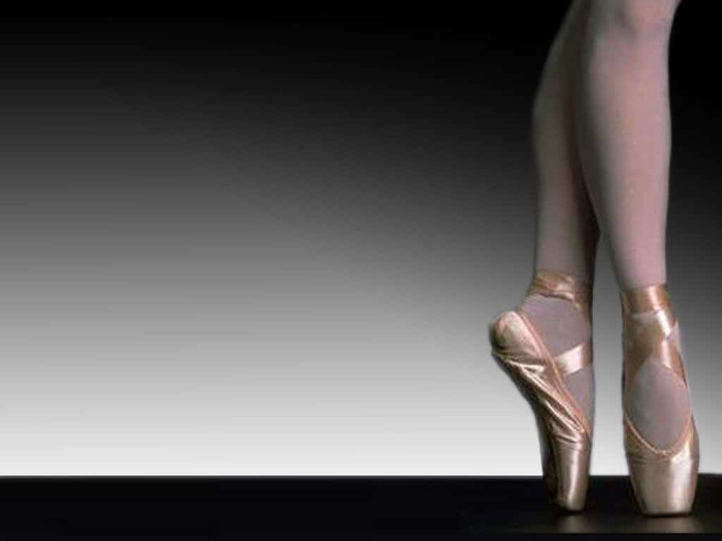 An Artistic Display Of The Beauty Of The Dance Pointe Shoes Background