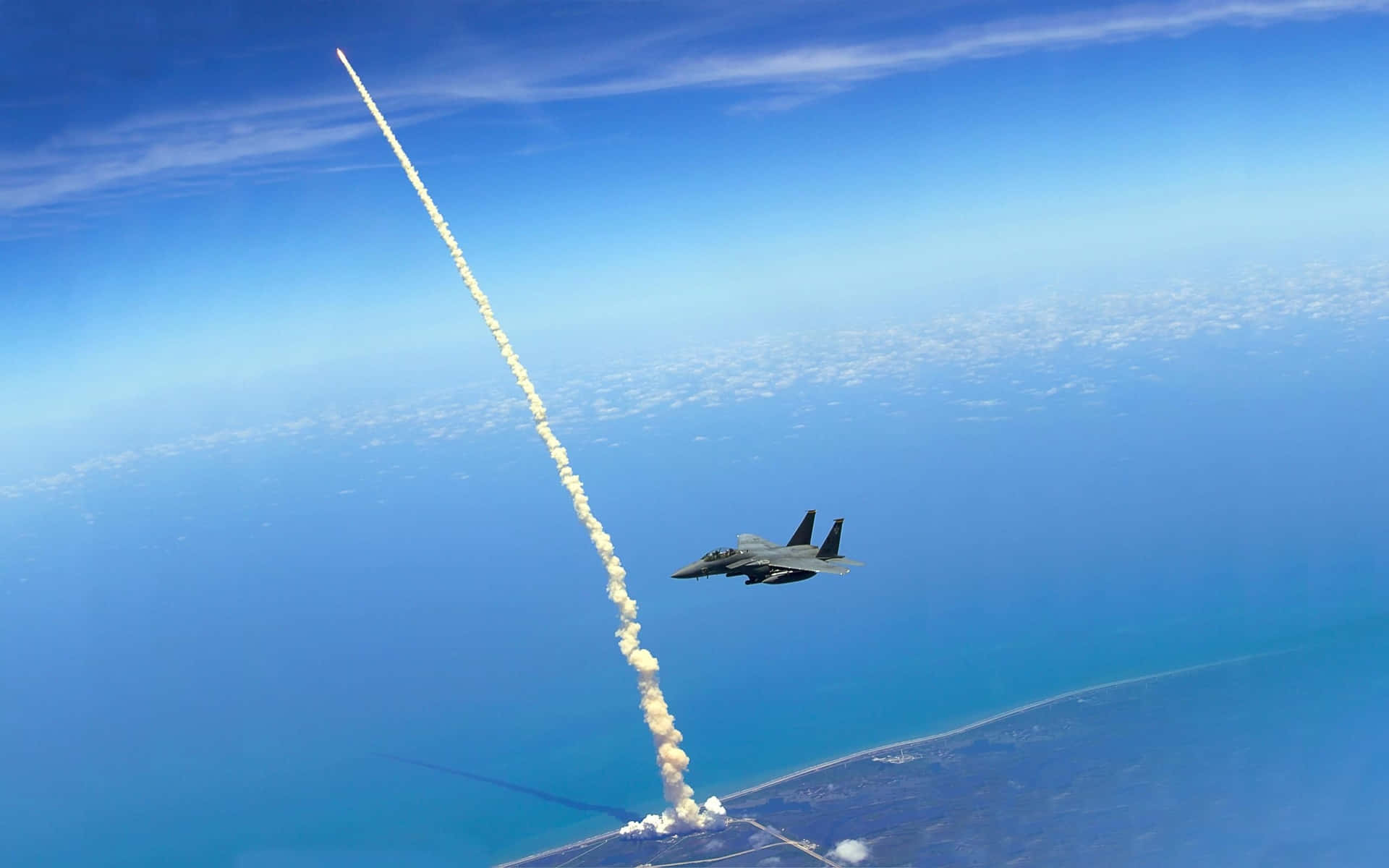 An Awesome View Of A Space Shuttle Soaring Through Space Background