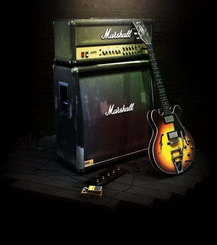 An Electric Guitar Rests Next To Its Amp