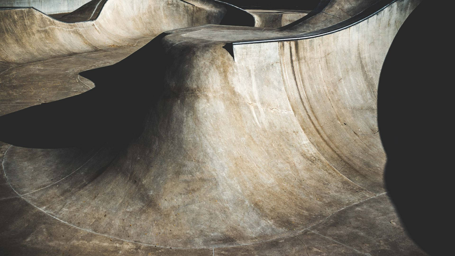 An Empty Skate Park Landscape With High Slope