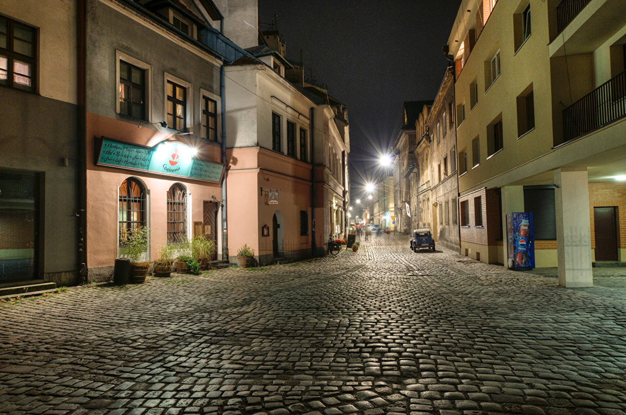 An Empty Street In Krakow, Poland At Night Background