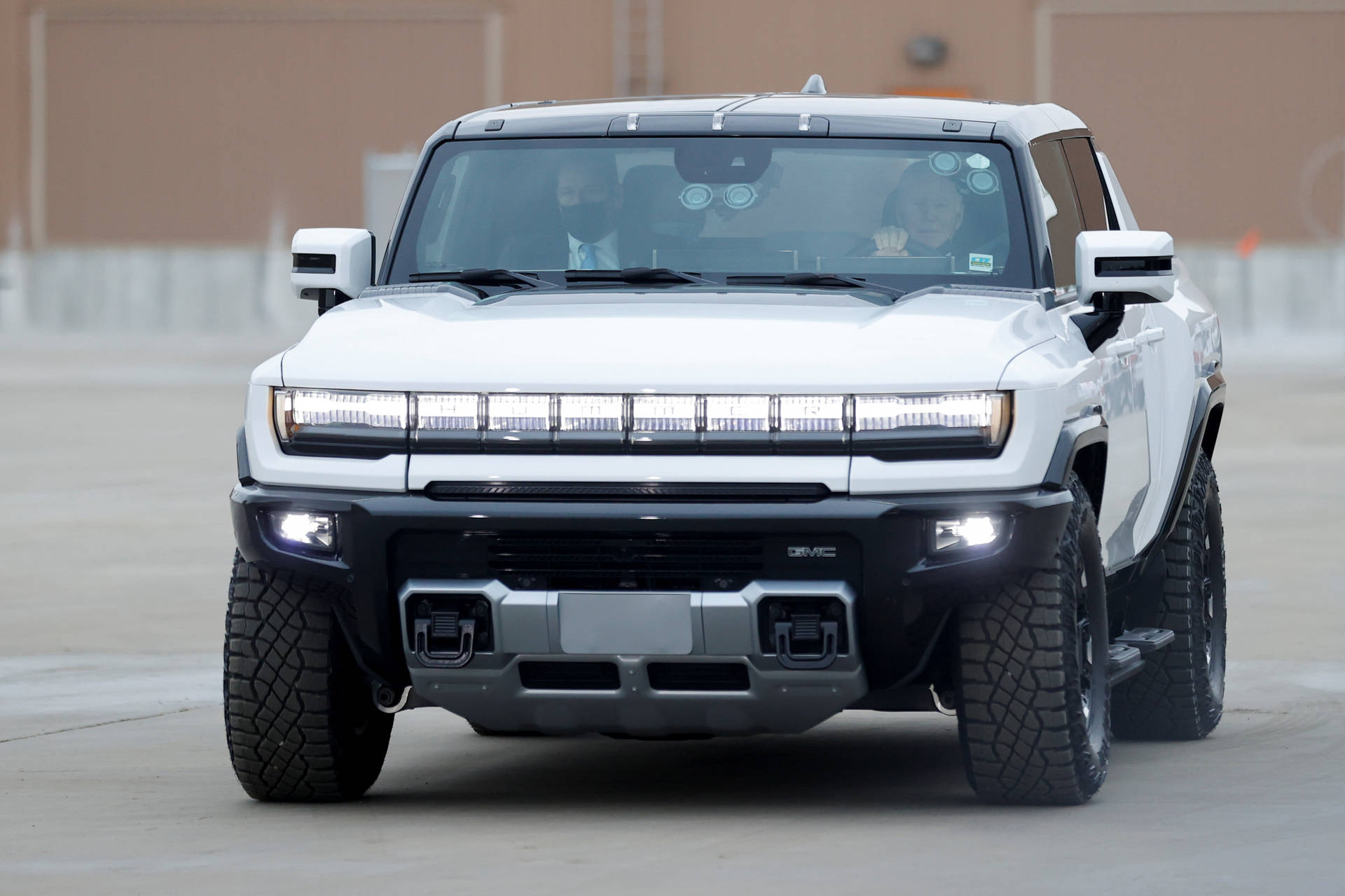 An Excellent Hummer Pickup Truck With White Headlights. Background