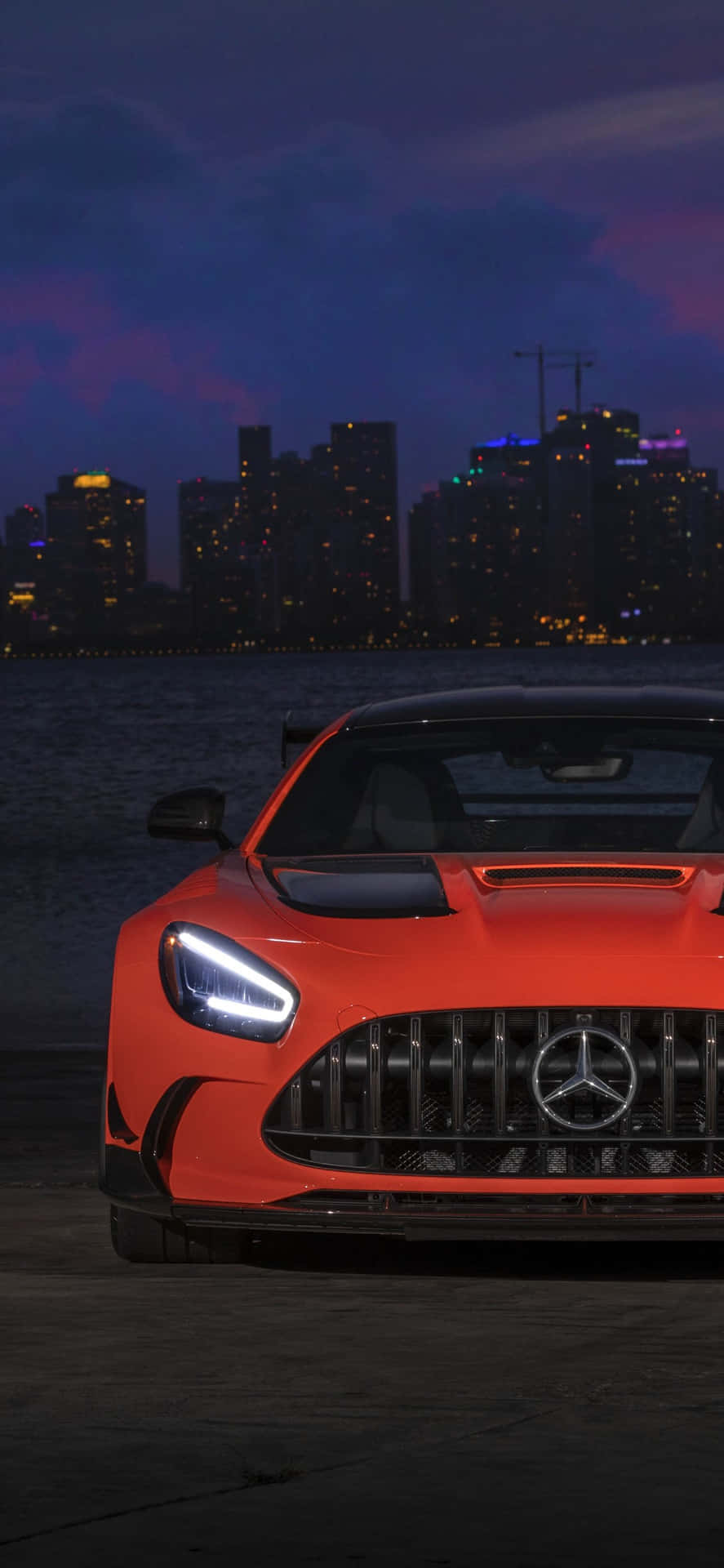 An Iconic Mercedes Gts Stands Out With A Sleek Black Exterior Background