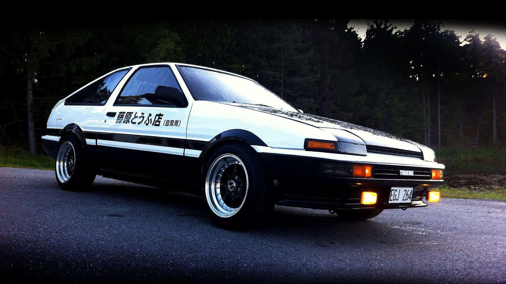 An Iconic Toyota Ae86 At The Drift Track Background