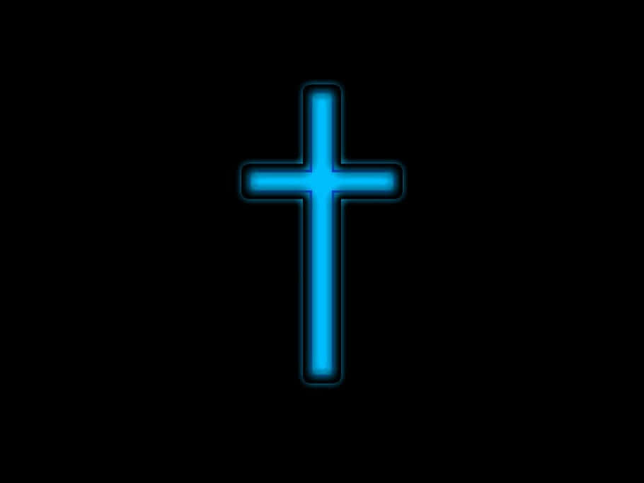 An Illuminated Cross Illuminated In Neon Colors Background