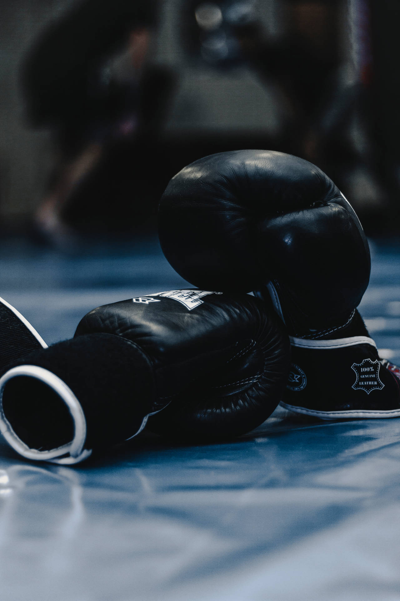 An Intense Boxing Match With Serious Sporting Style Background