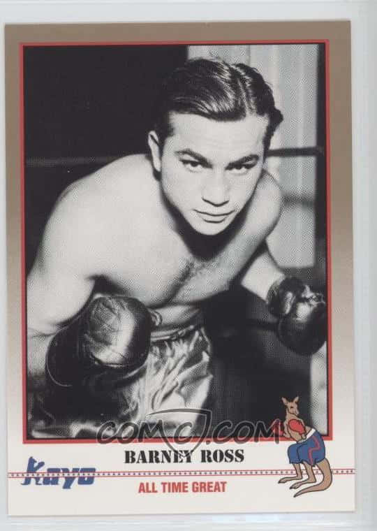 An Intense Moment Of Survival With Barney Ross Background