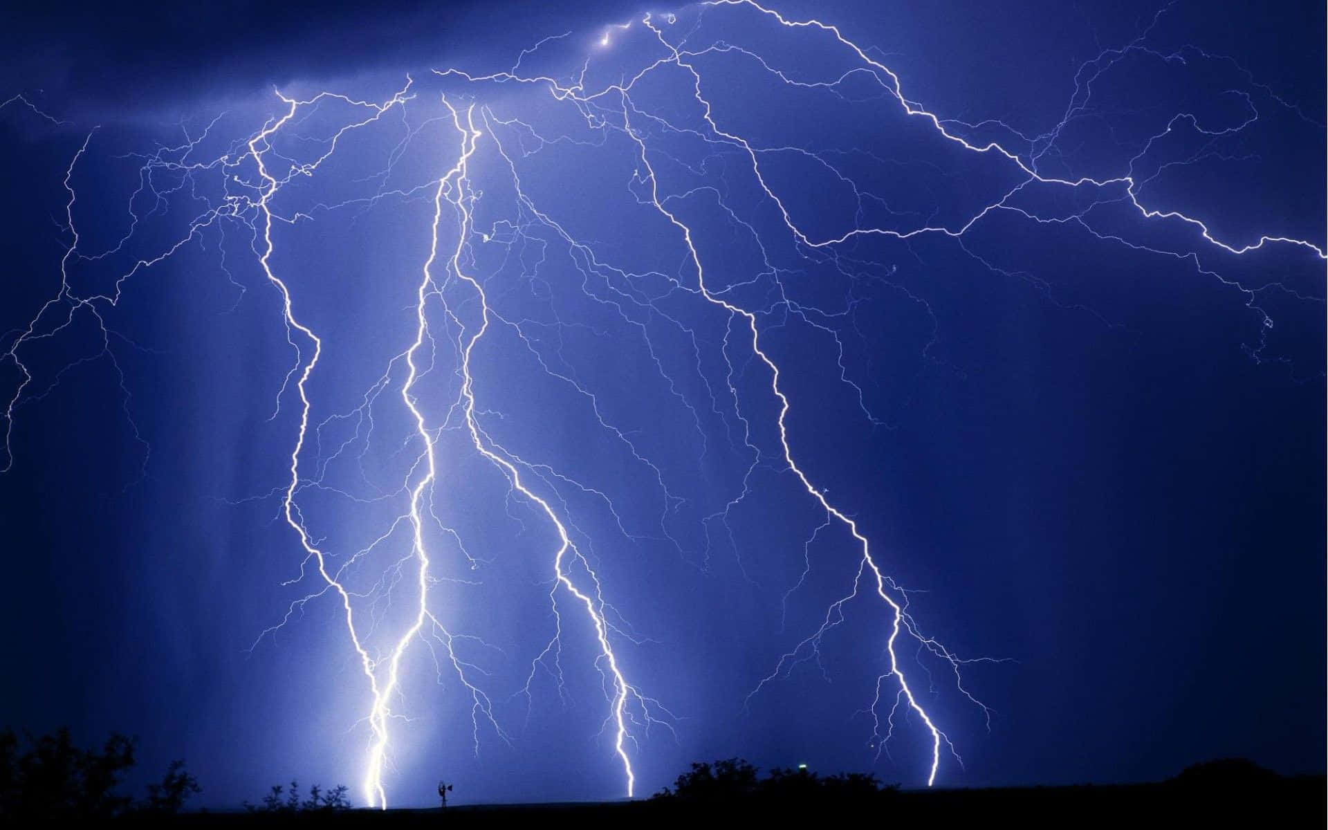 An Intense Thunderstorm With Brilliant Blue Lightning. Background