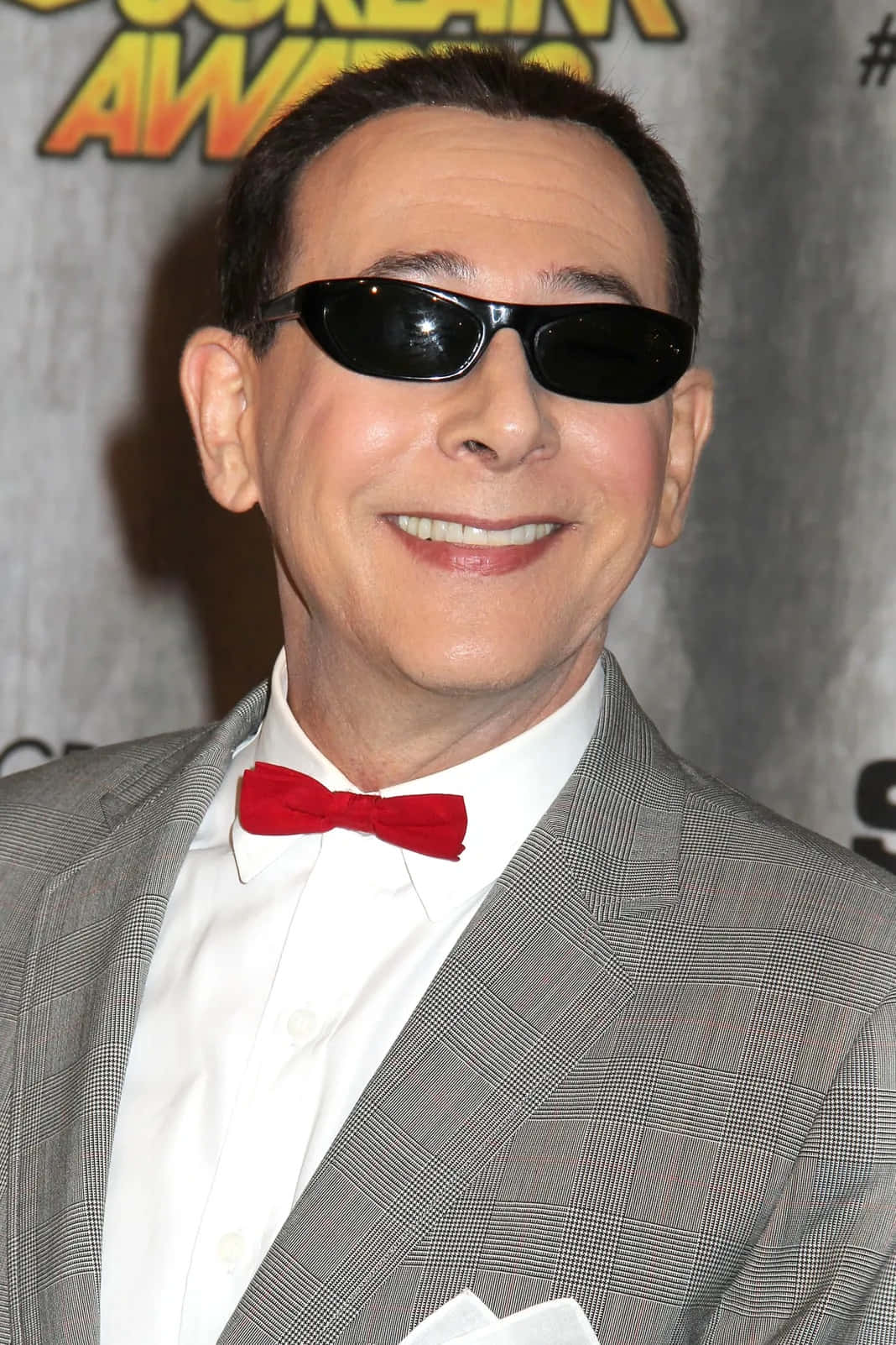 An Intensive Portrait Of Paul Reubens Background