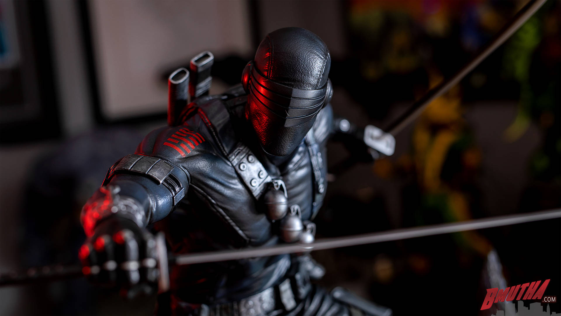 An Intricate Figurine Of Snake Eyes In Dynamic Pose Background