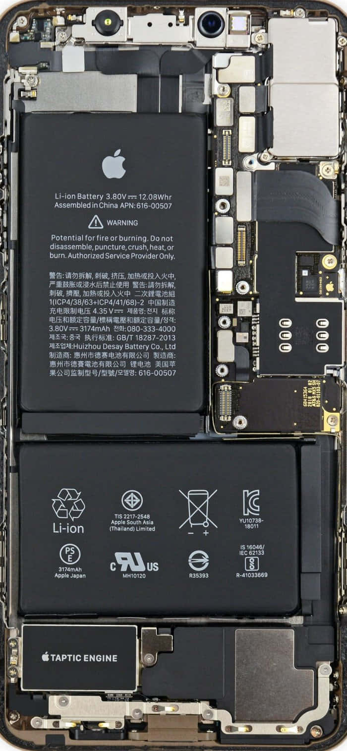 An Iphone With A Battery And Other Parts Background