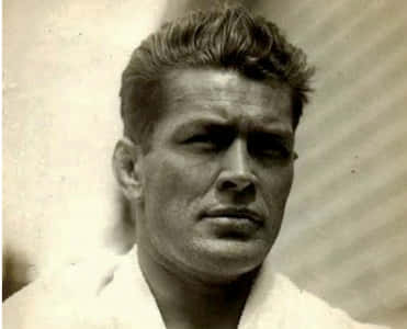 An Old Portrait Of Gene Tunney Background
