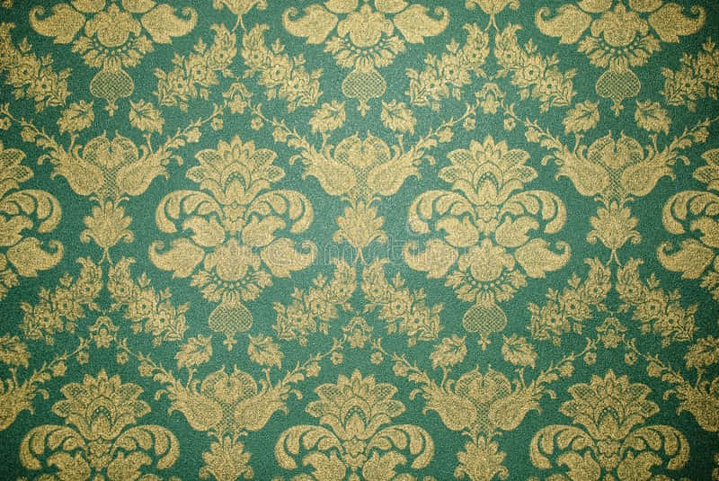 An Old Wallpaper With Gold And Green Floral Patterns Background