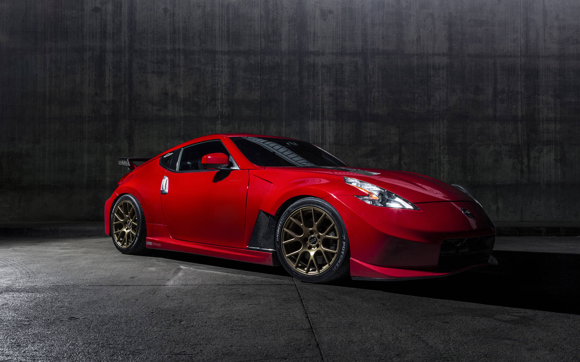 An Open View Of The Sleek Black Nissan 370z In Its Full Glory