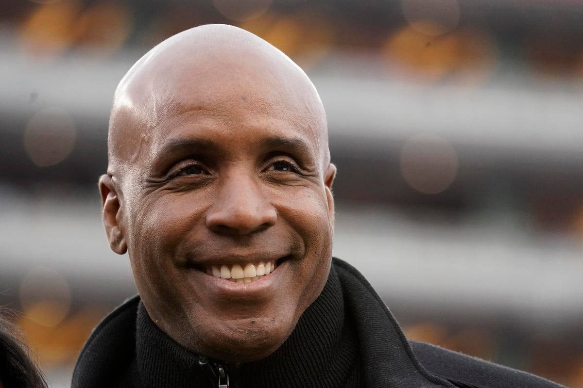 An Uplifting Portrait Of Barry Bonds With A Radiant Smile.