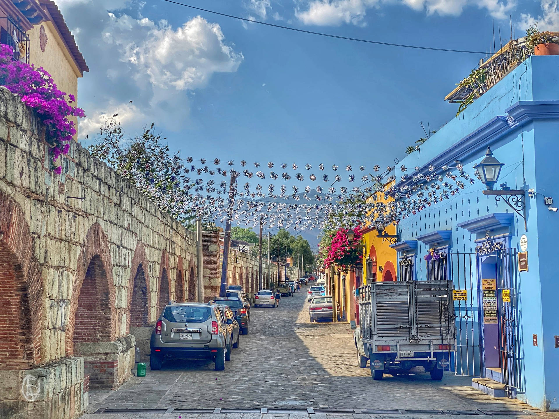 An Urban Street In Oaxaca Background