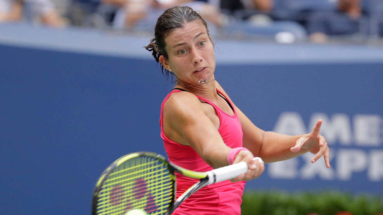 Anastasija Sevastova Dressed In A Pink Sports Top