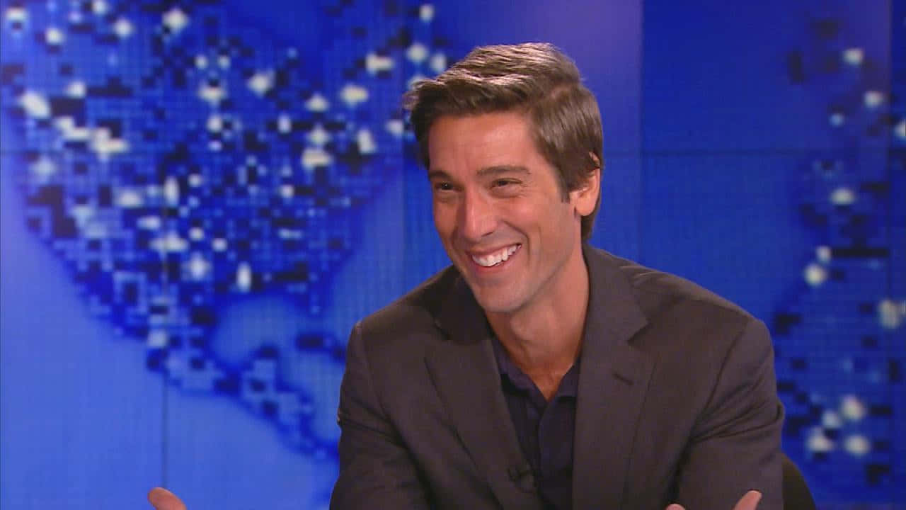 Anchor David Muir With His Captivating Smile Background