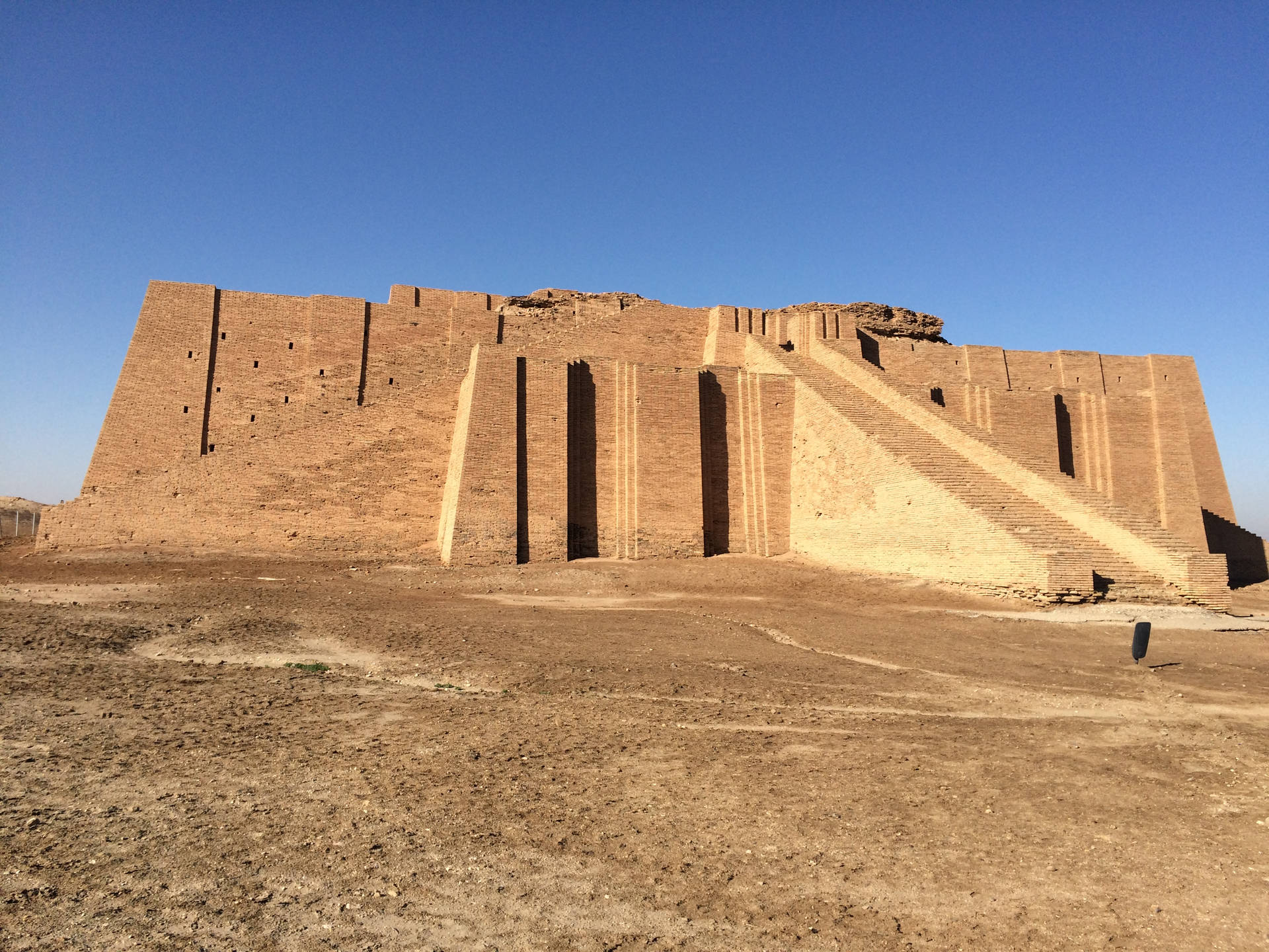 Ancient City Of Ur Underneath A Clear Blue Sky Background