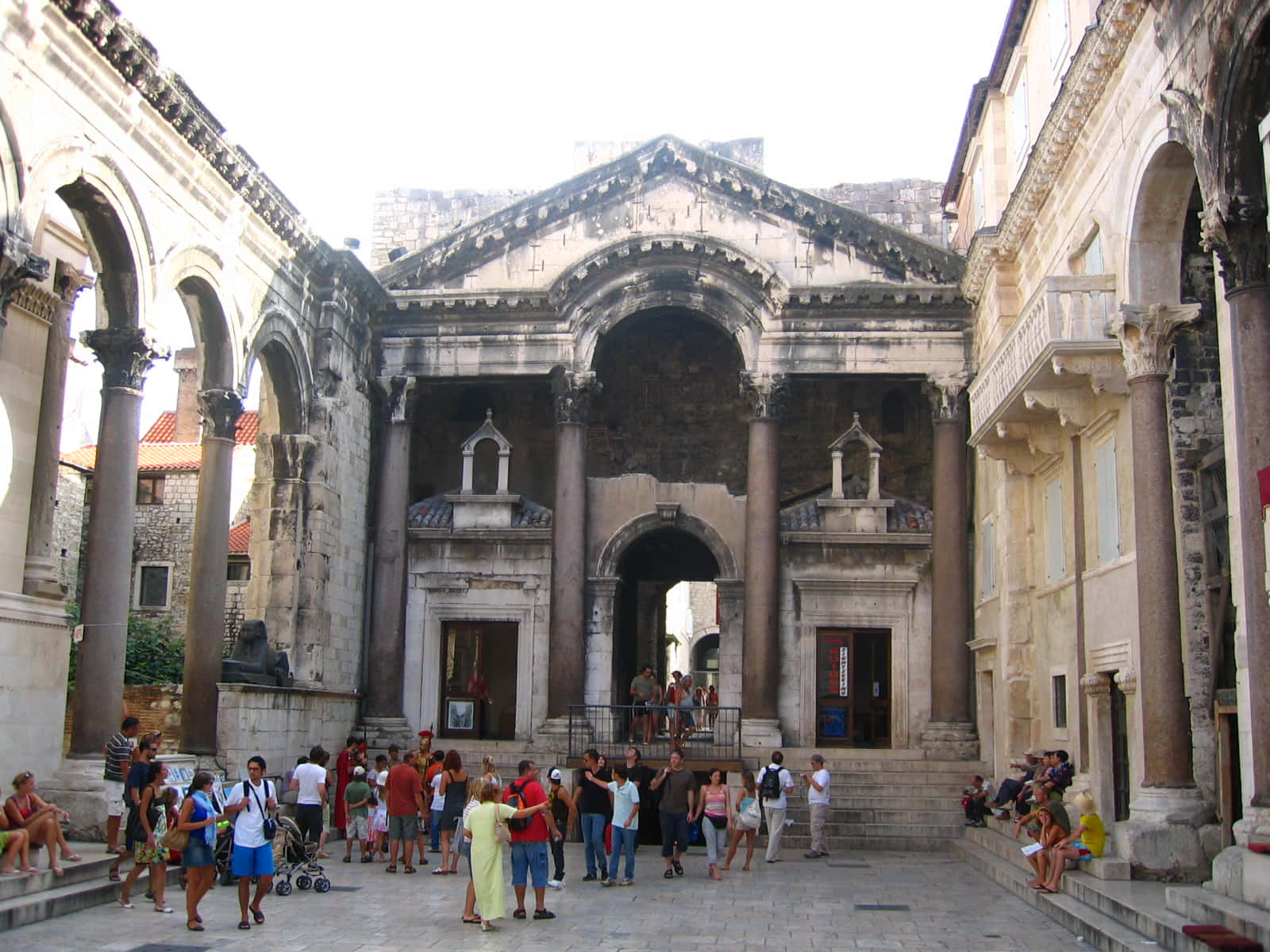 Ancient Diocletians Palace With Visitors Background