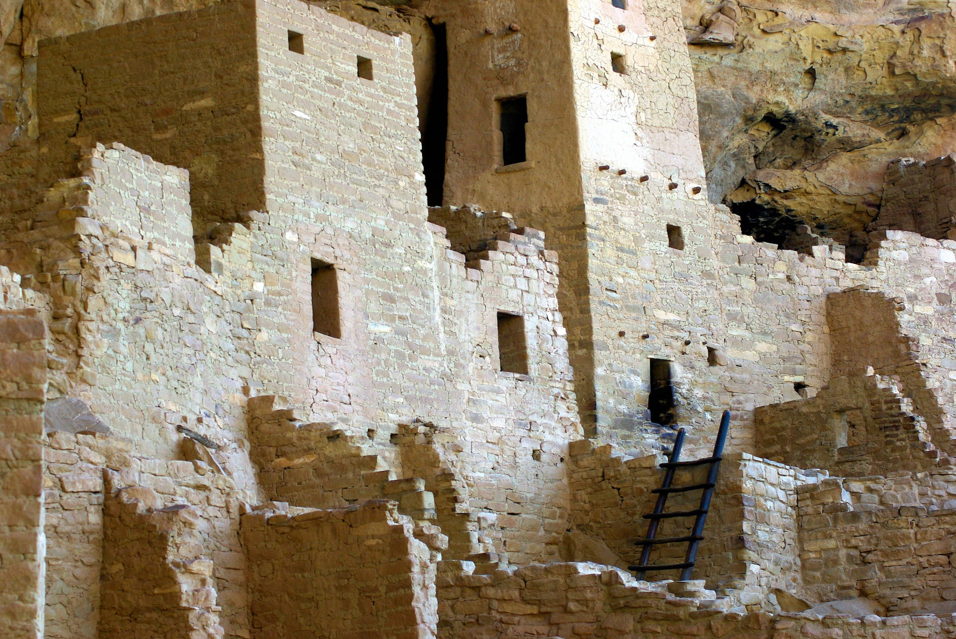 Ancient Mesa Verde Ruins Beneath A Brilliant Sky