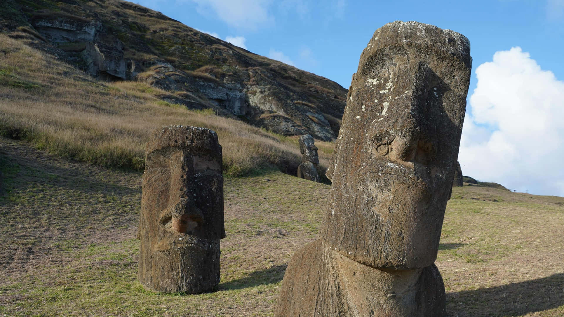 Ancient Moai Statues Standing Tall On Easter Island, Chile Background