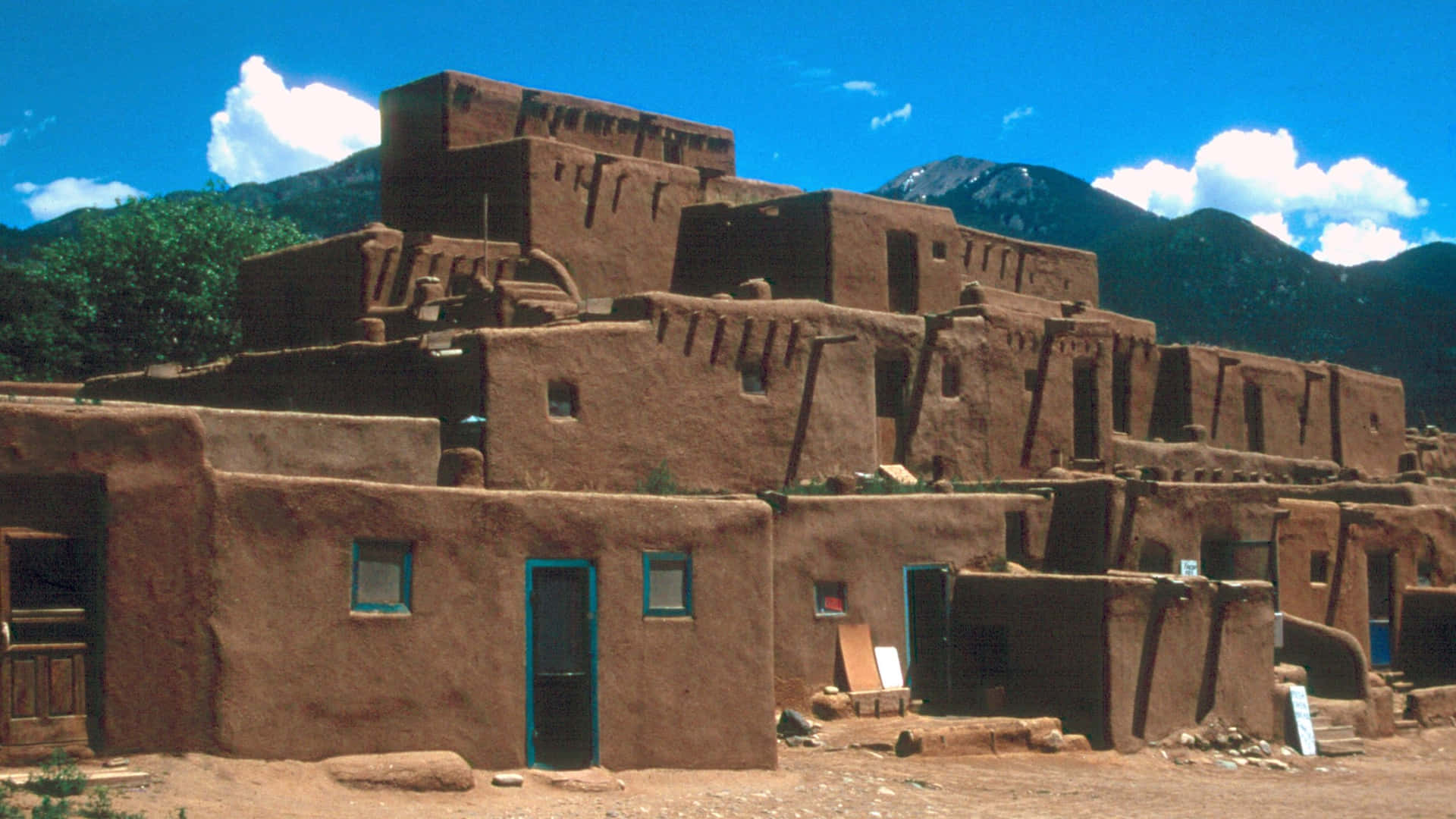 Ancient Native Architecture At Taos Pueblo Background