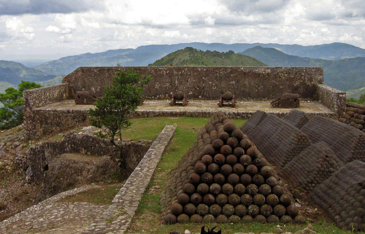 Ancient Rock Fortress Of Citadelle Laferriere In Haiti Background