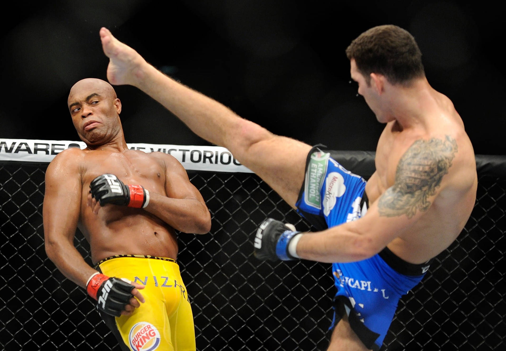 Anderson Silva Avoiding Kick Background