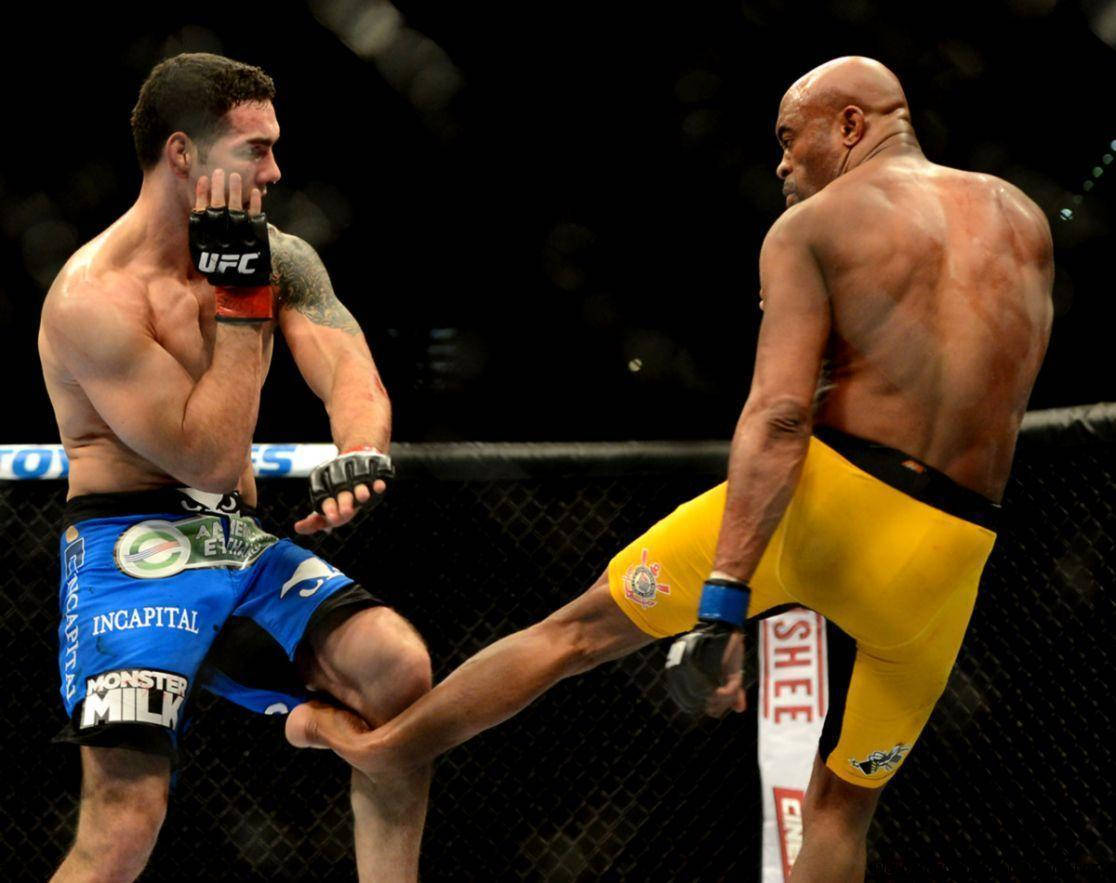 Anderson Silva Kick Opponent Knee Background