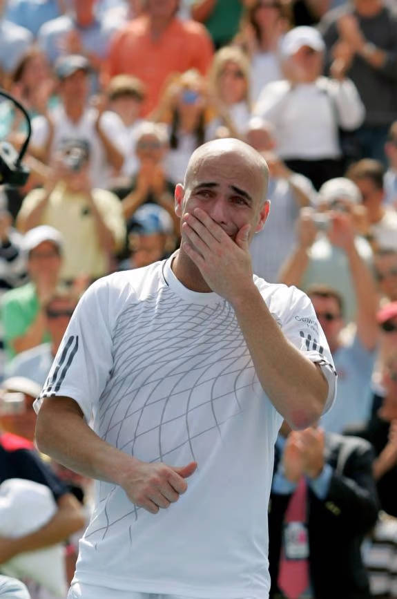 Andre Agassi In Action On The Tennis Court Background