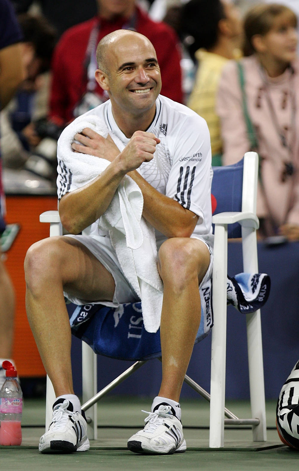 Andre Agassi Sitting And Smiling Background