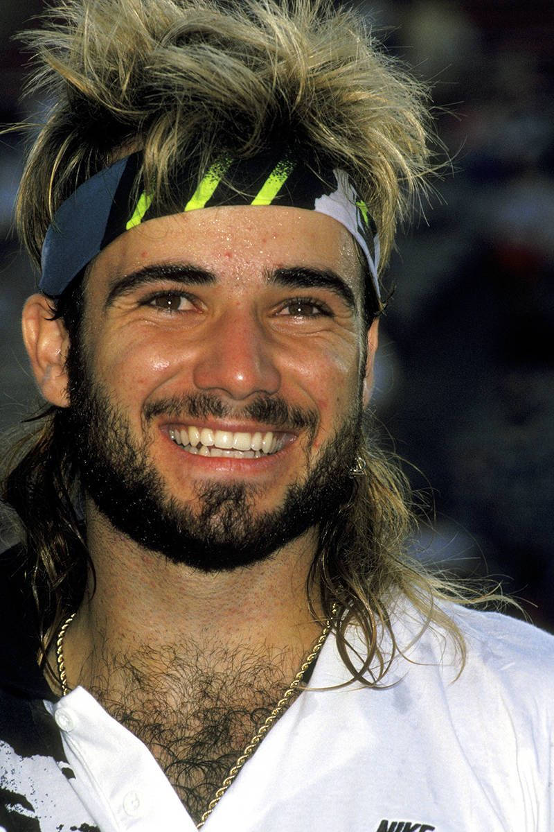 Andre Agassi Sporting A Long Mullet Background