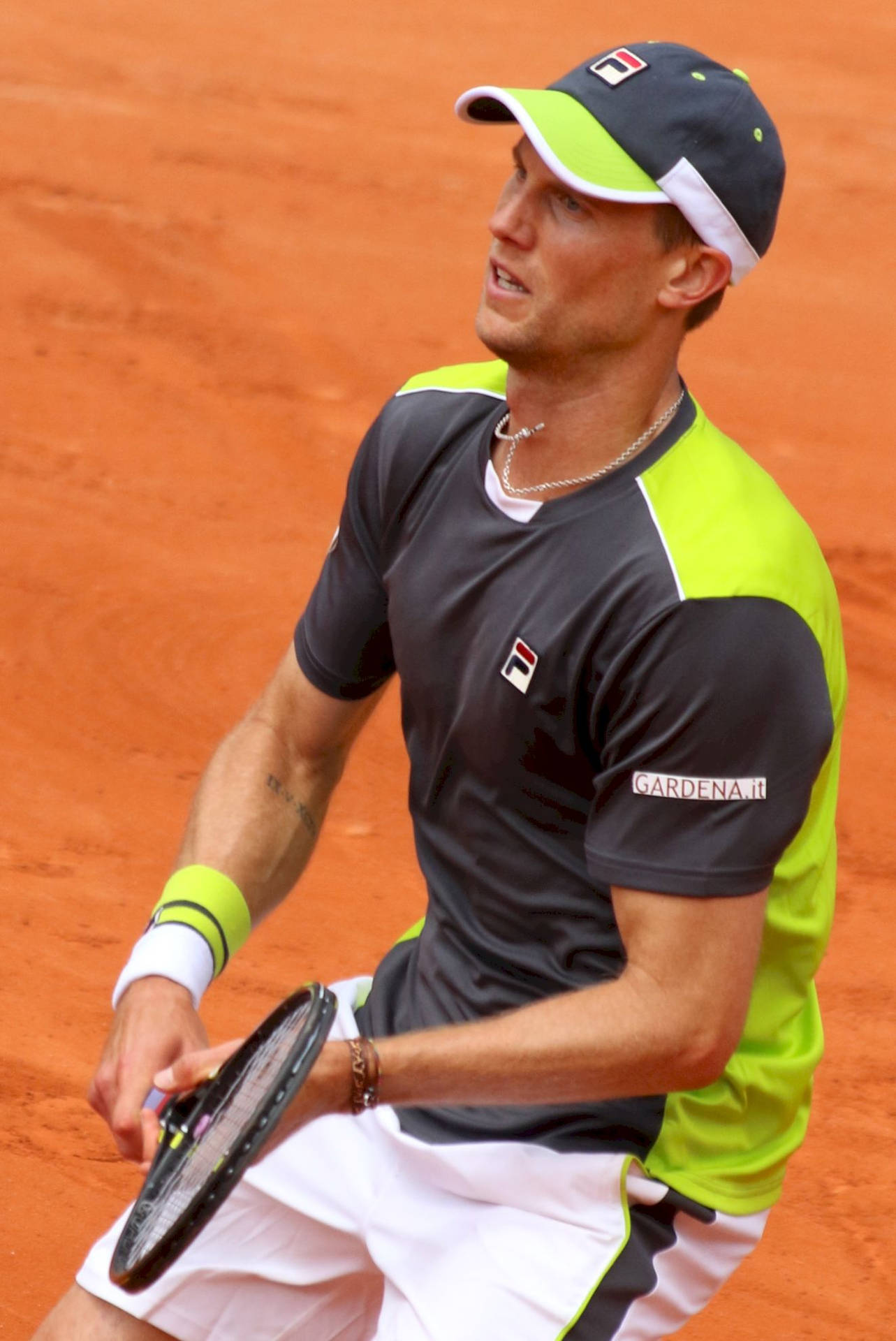 Andreas Seppi In Action On A Clay Court Background