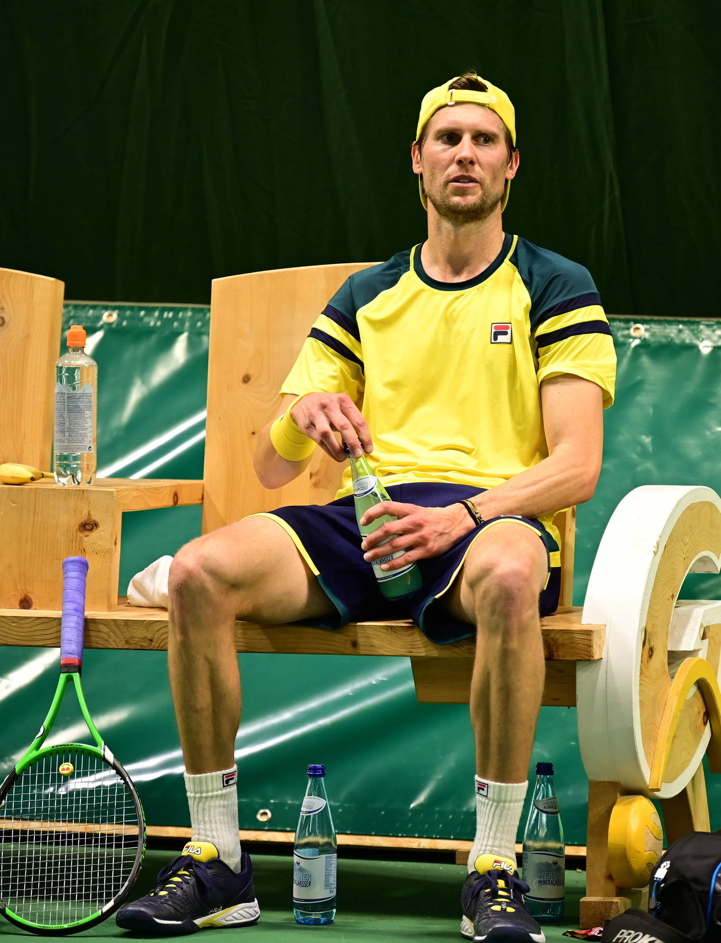 Andreas Seppi Reflectively Sitting On A Bench