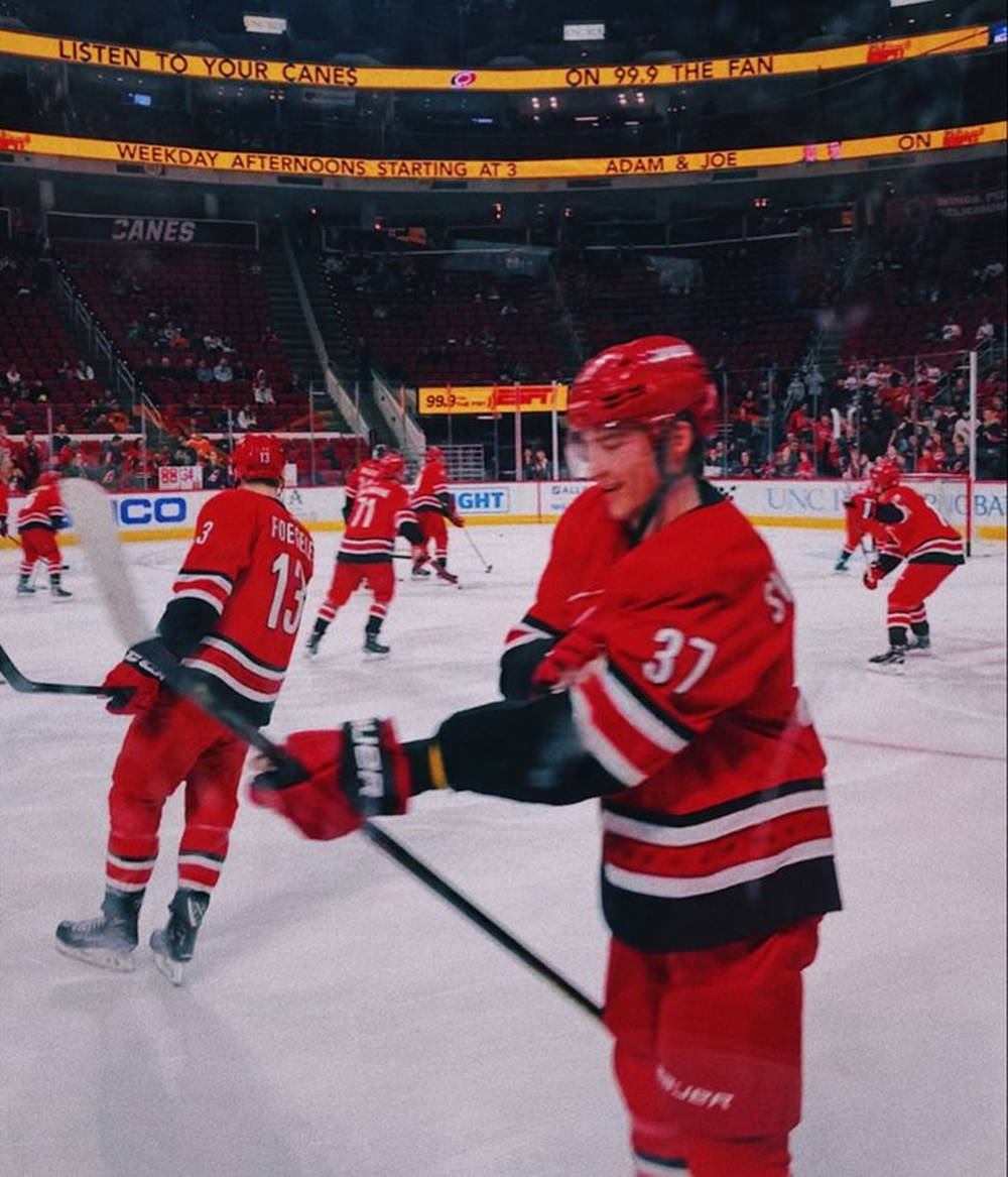 Andrei Svechnikov Of Carolina Hurricanes In Action Background