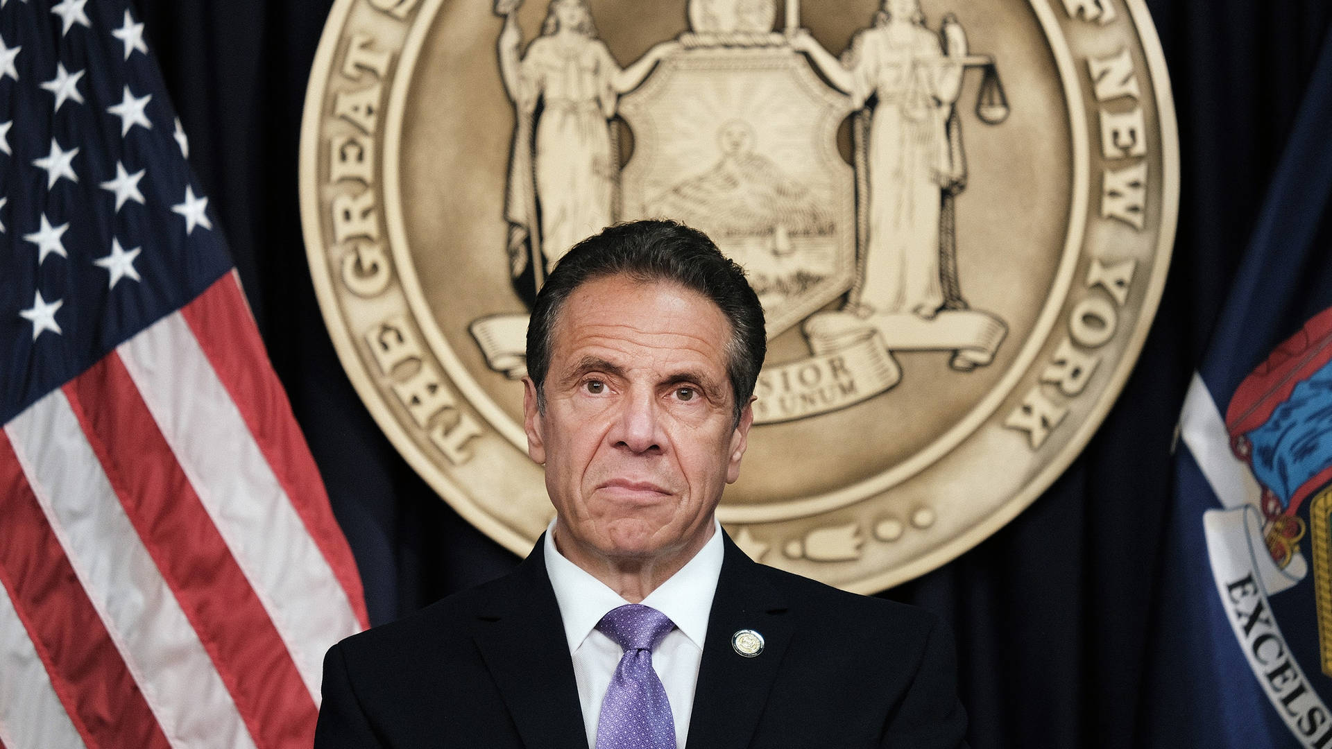 Andrew Cuomo In A Press Conference Background