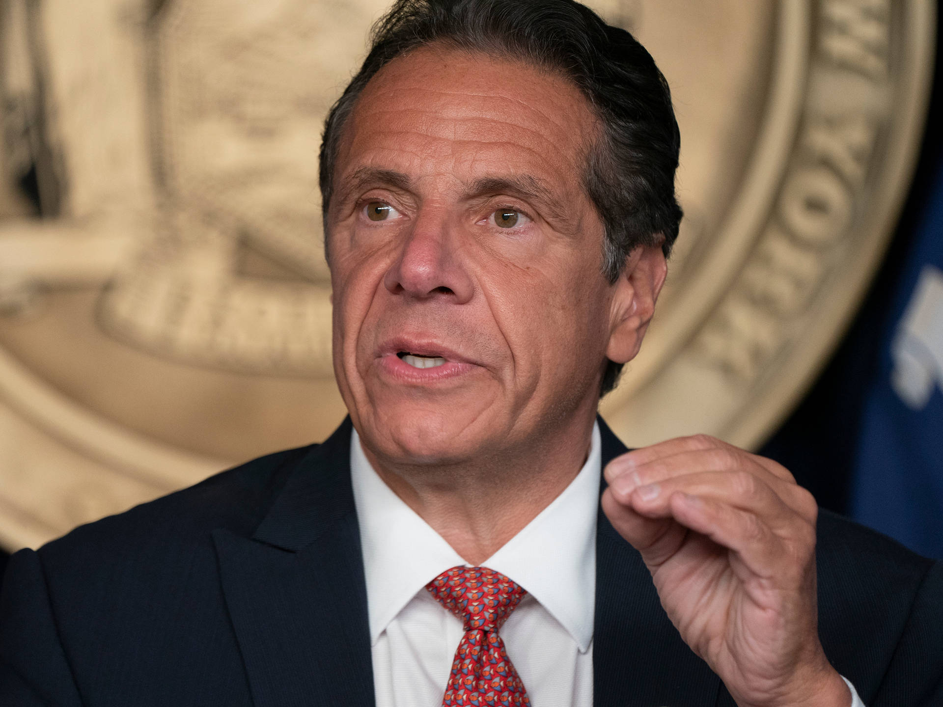 Andrew Cuomo's Hand Gesture Background