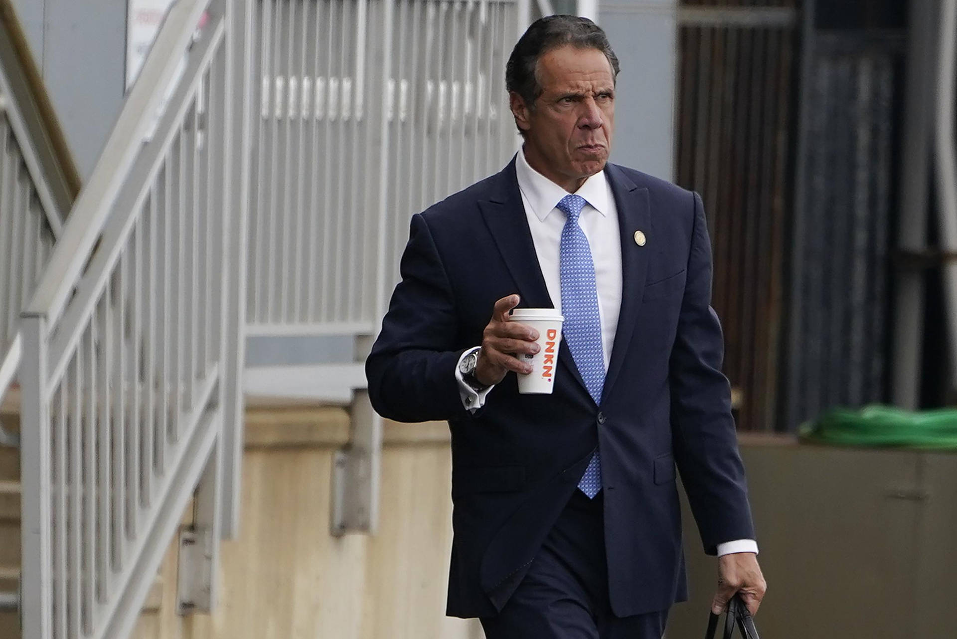 Andrew Cuomo Walking Outside Background