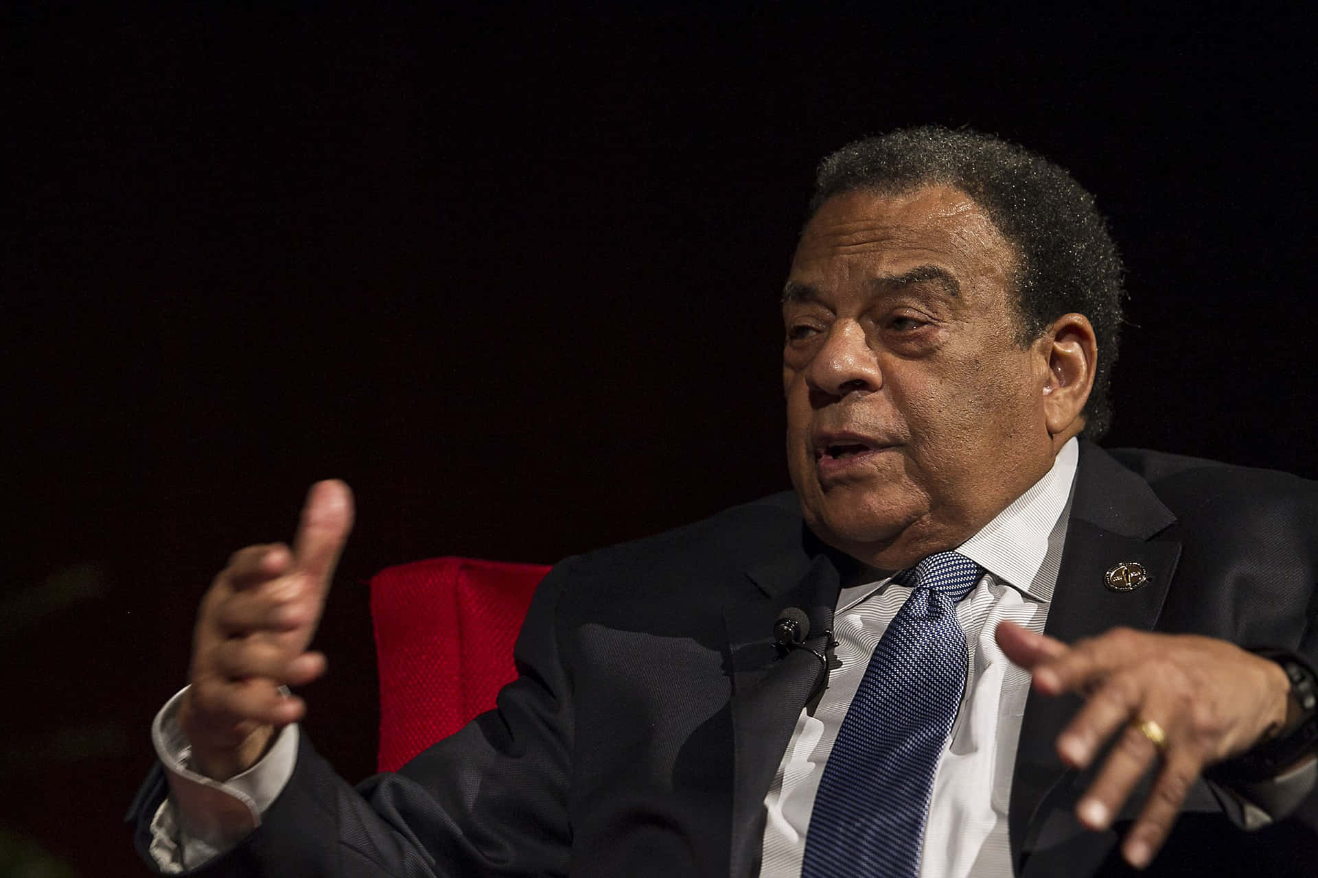 Andrew Young Delivering A Speech Background