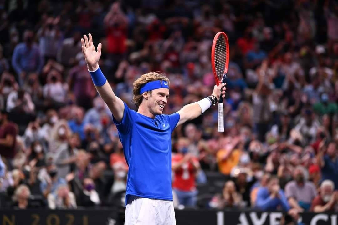 Andrey Rublev With Arms Wide Open Background