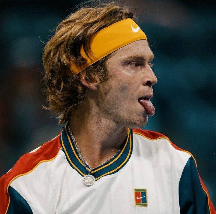 Andrey Rublev With His Tongue Out Background