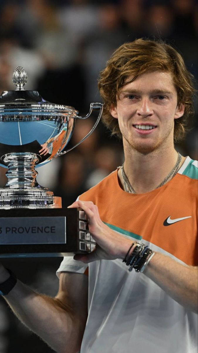 Andrey Rublev With Silver Trophy Background