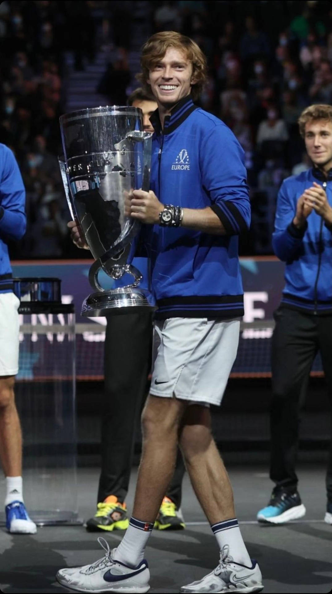 Andrey Rublev With Trophy Background