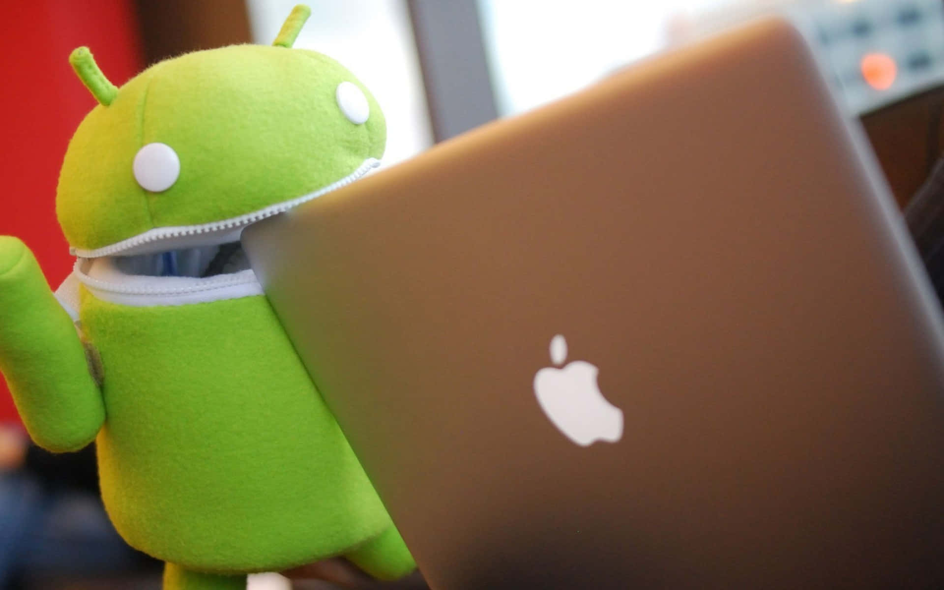 Android Eating Apple Macbook Background