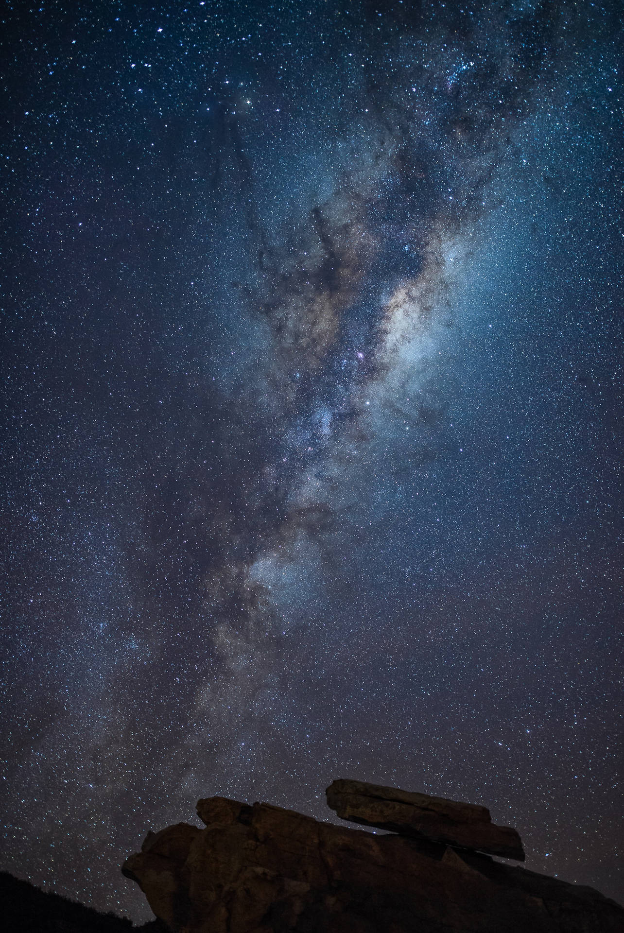 Andromeda Galaxy Rock Formation Background